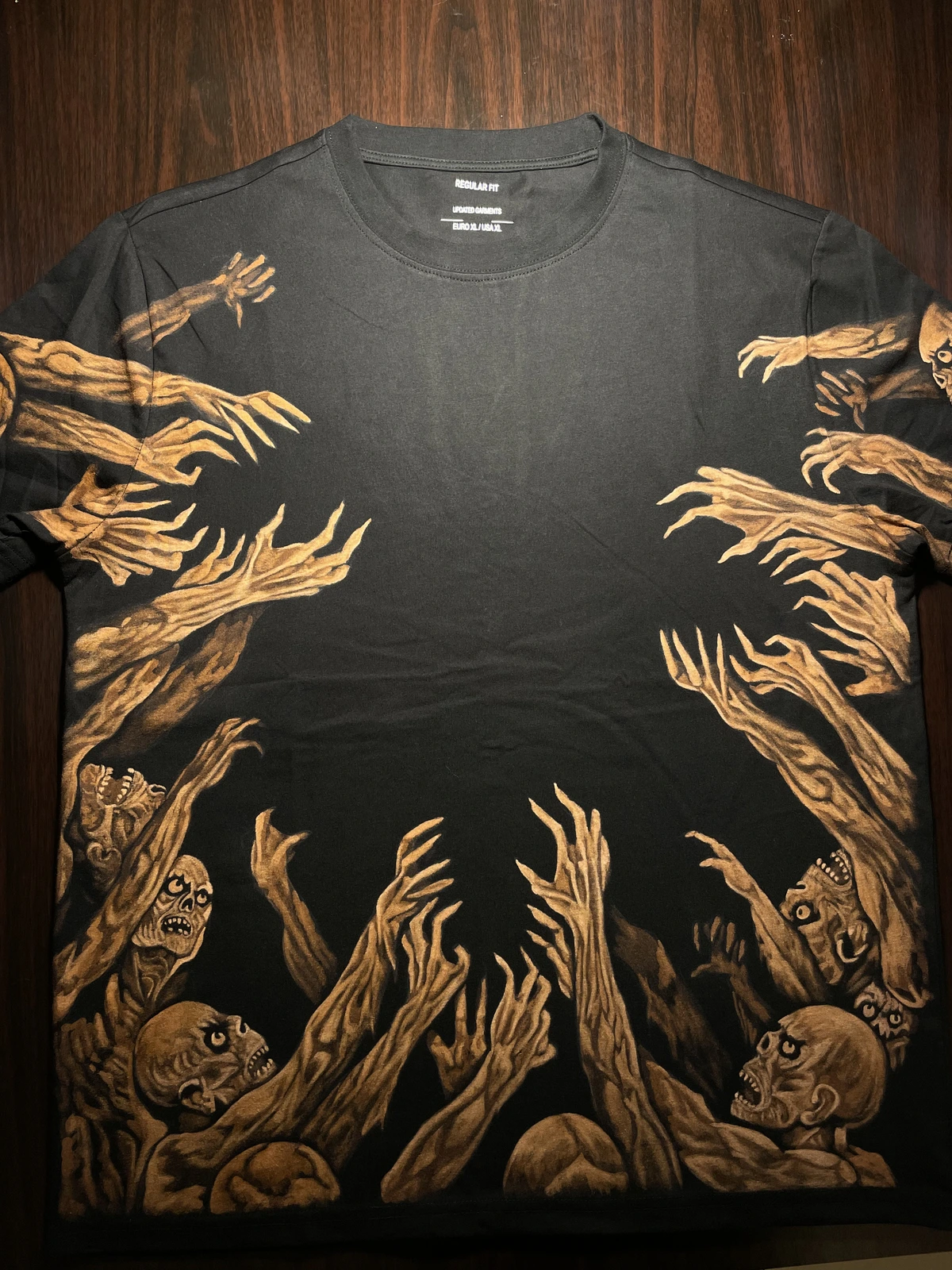 Handmade zombie hands bleach art design on black T-shirt