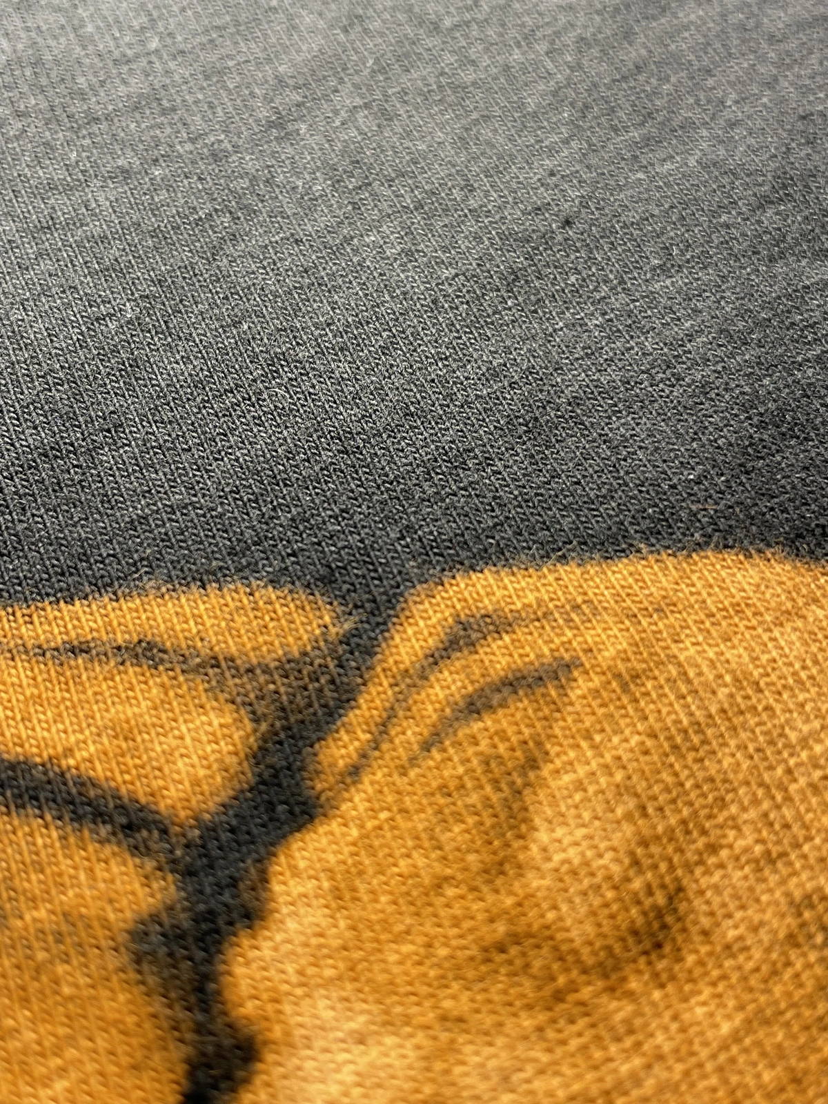 Close up of fuzzy black 100 percent cotton fabric used for bleach art painting