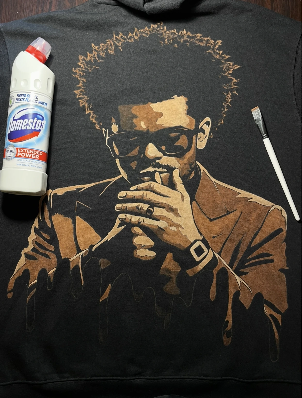 Finished bleach art hoodie made on 80 cotton 20 polyester black fabric