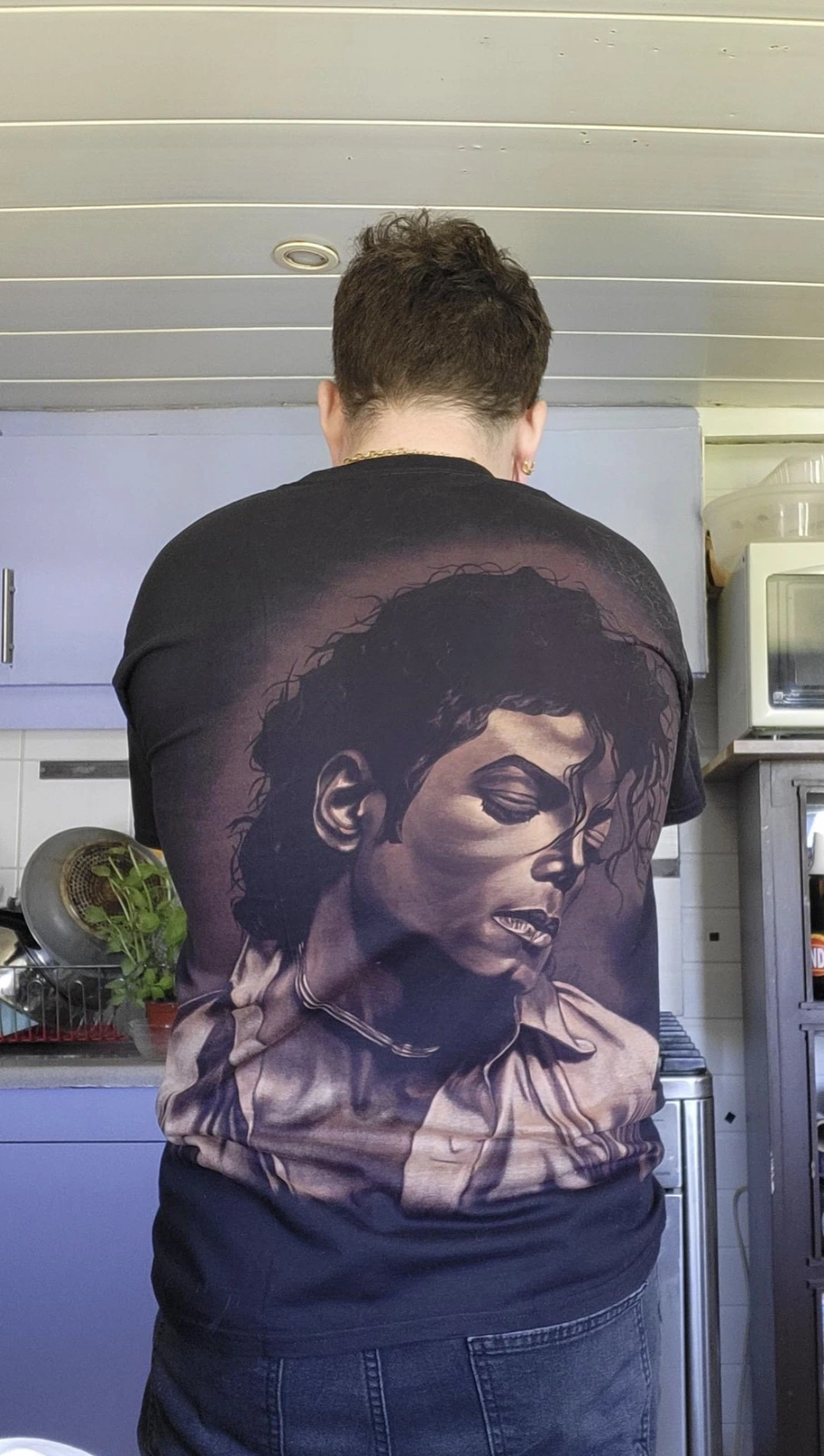 Client wearing finished custom bleach art clothing created from a personal design idea