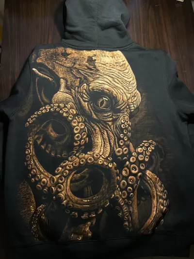 Handmade bleach art design on black clothing by HandPaintedCloth