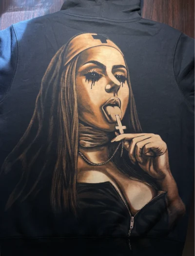 Handmade bleach art hoodie with detailed design on black fabric