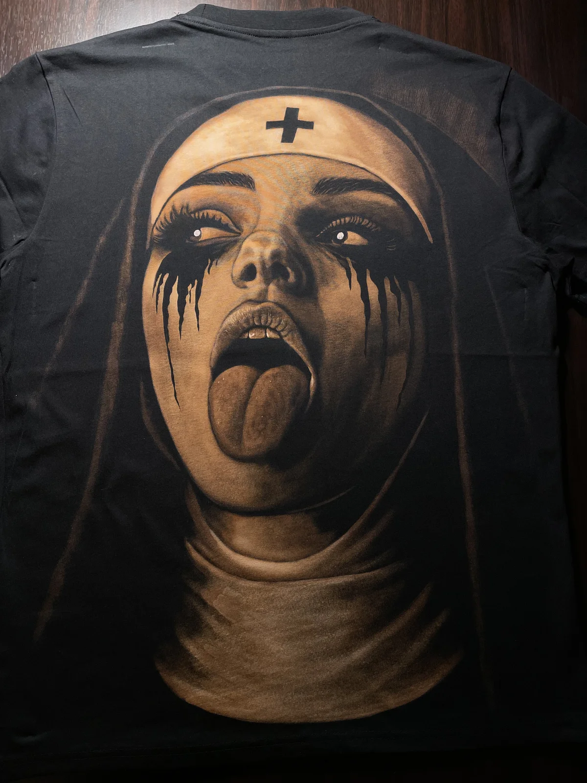 Custom bleach art t-shirt with rebellious nun portrait handmade design