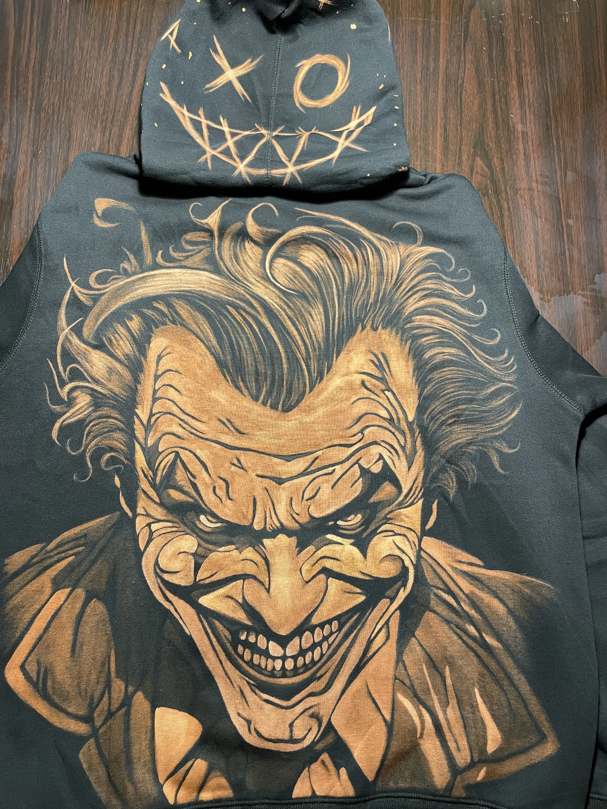 large joker bleach art back design on black hoodie