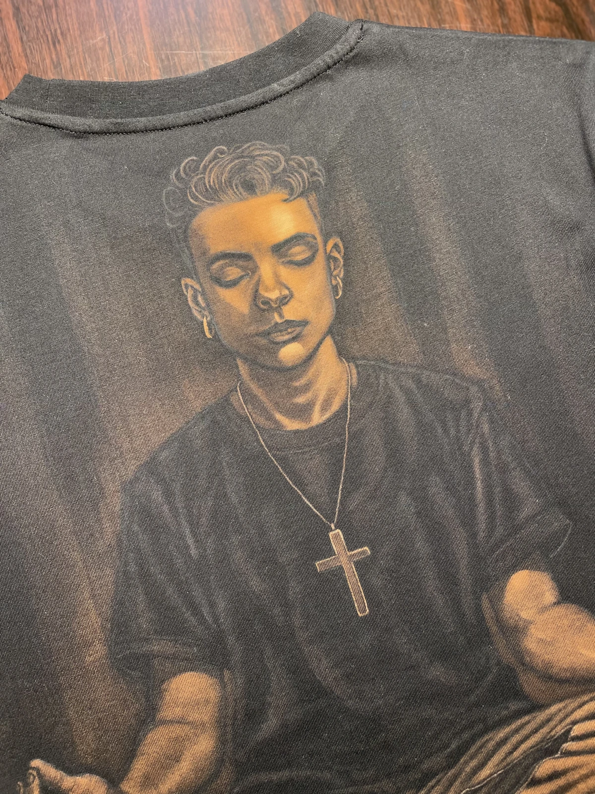 macro detail of occult portrait bleach art on T-shirt