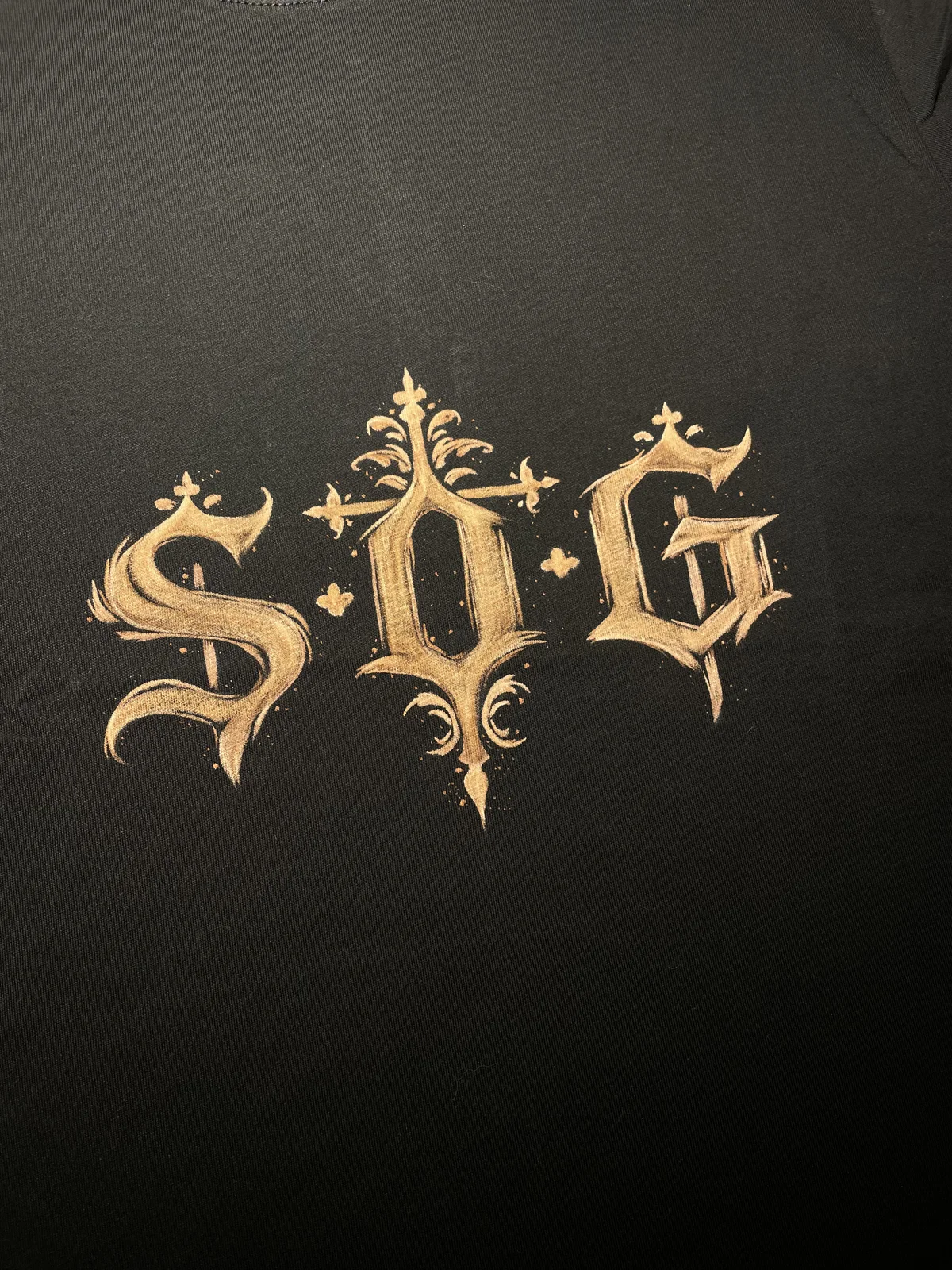 Close-up of front bleach art design on custom t-shirt