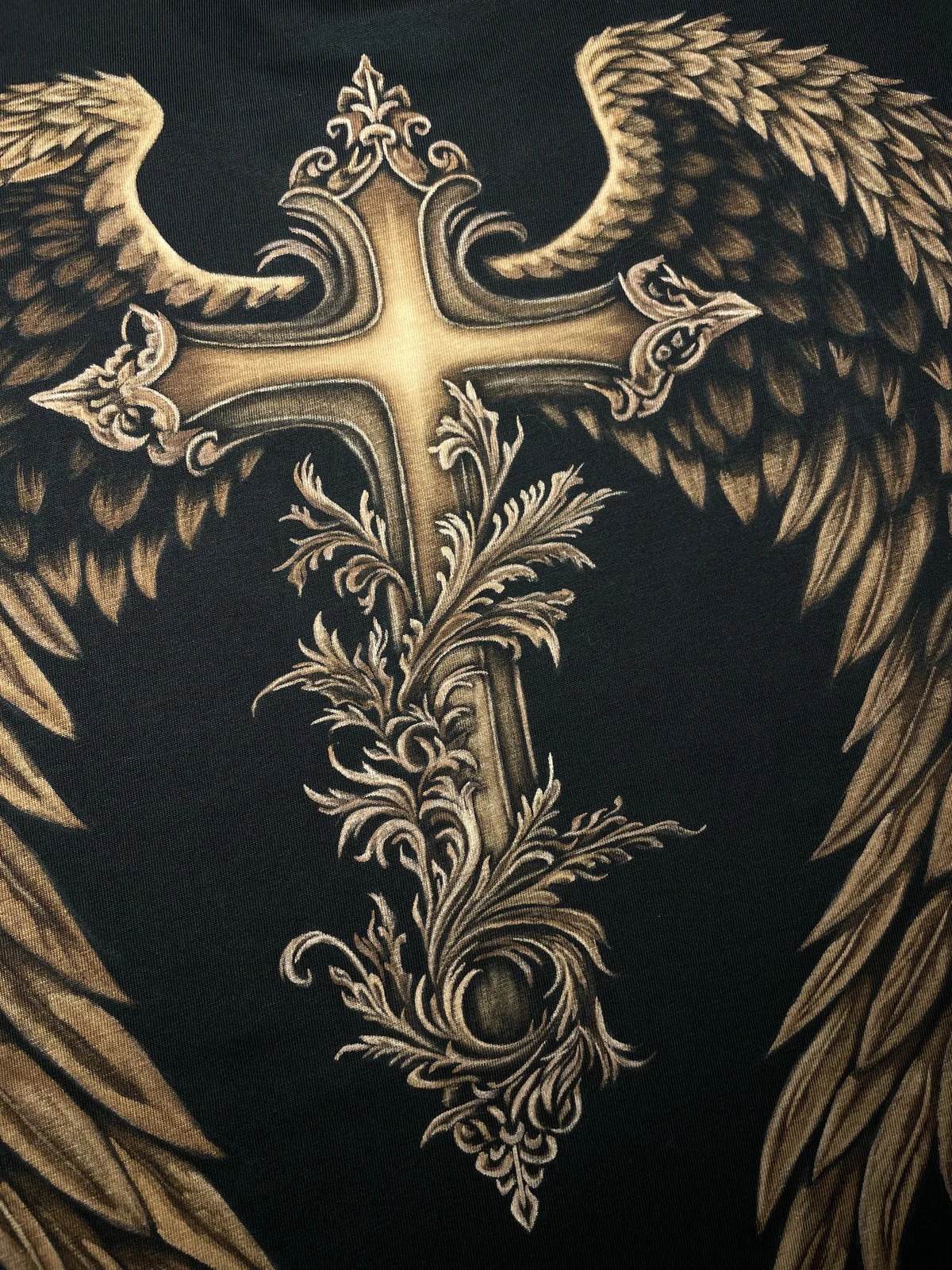 Close-up of handmade bleach art back design on custom t-shirt