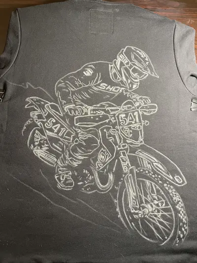 Chalk sketch of handmade bleach art hoodie design on back