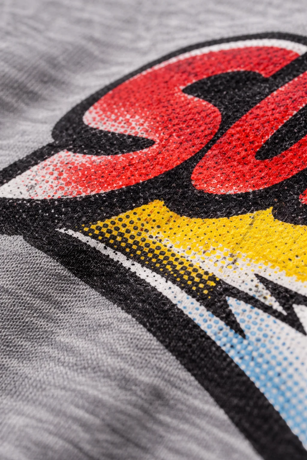 Close-up of printed graphic on t-shirt fabric
