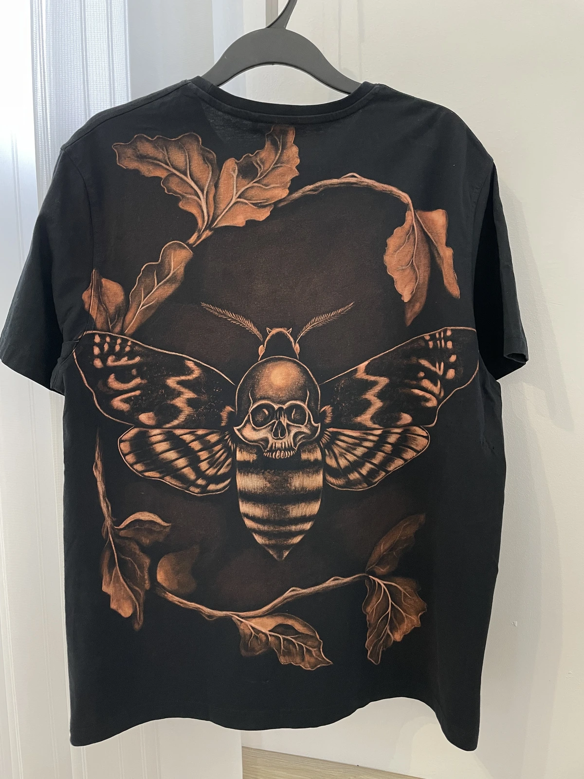 Black bleach design shirt worn as handmade clothing