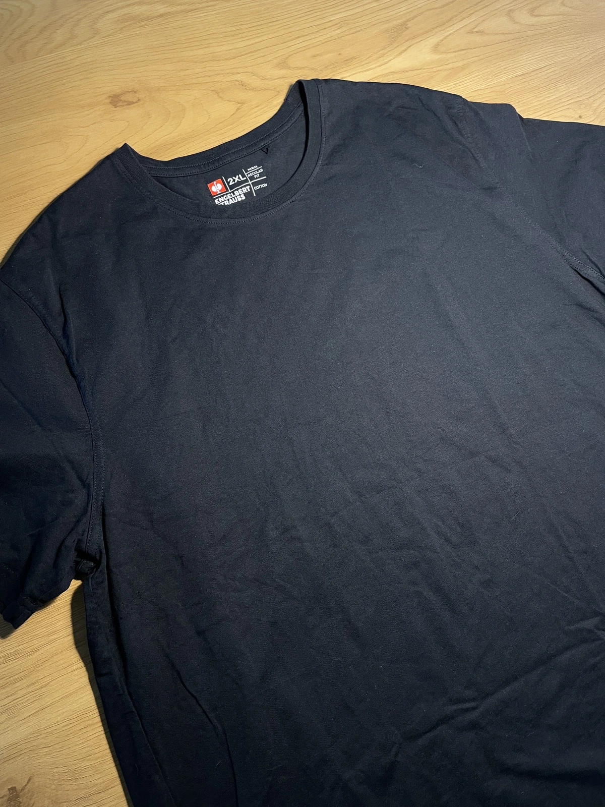 Plain black cotton shirt before making a bleach design