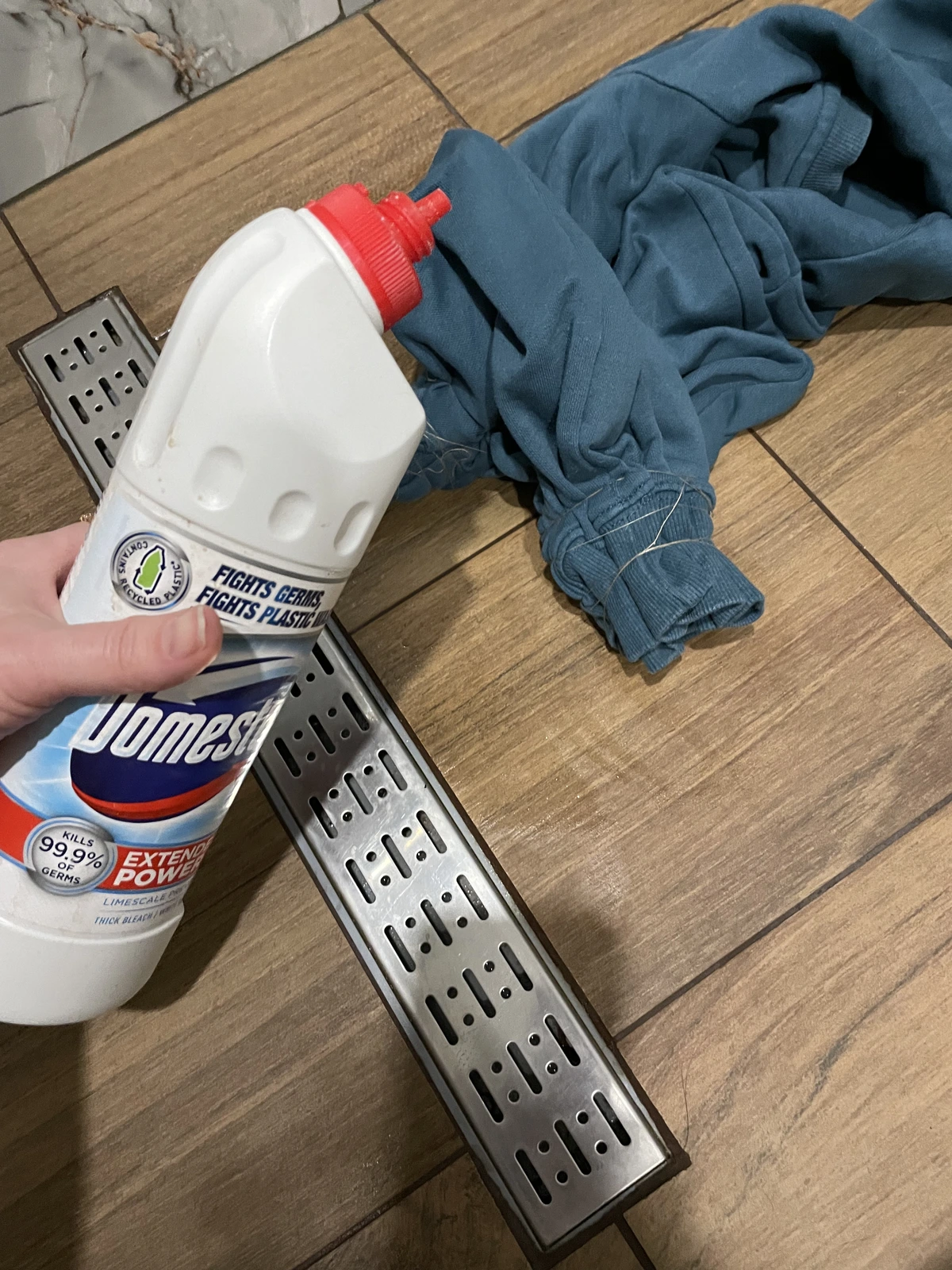 applying bleach to sweatshirt to cover stains