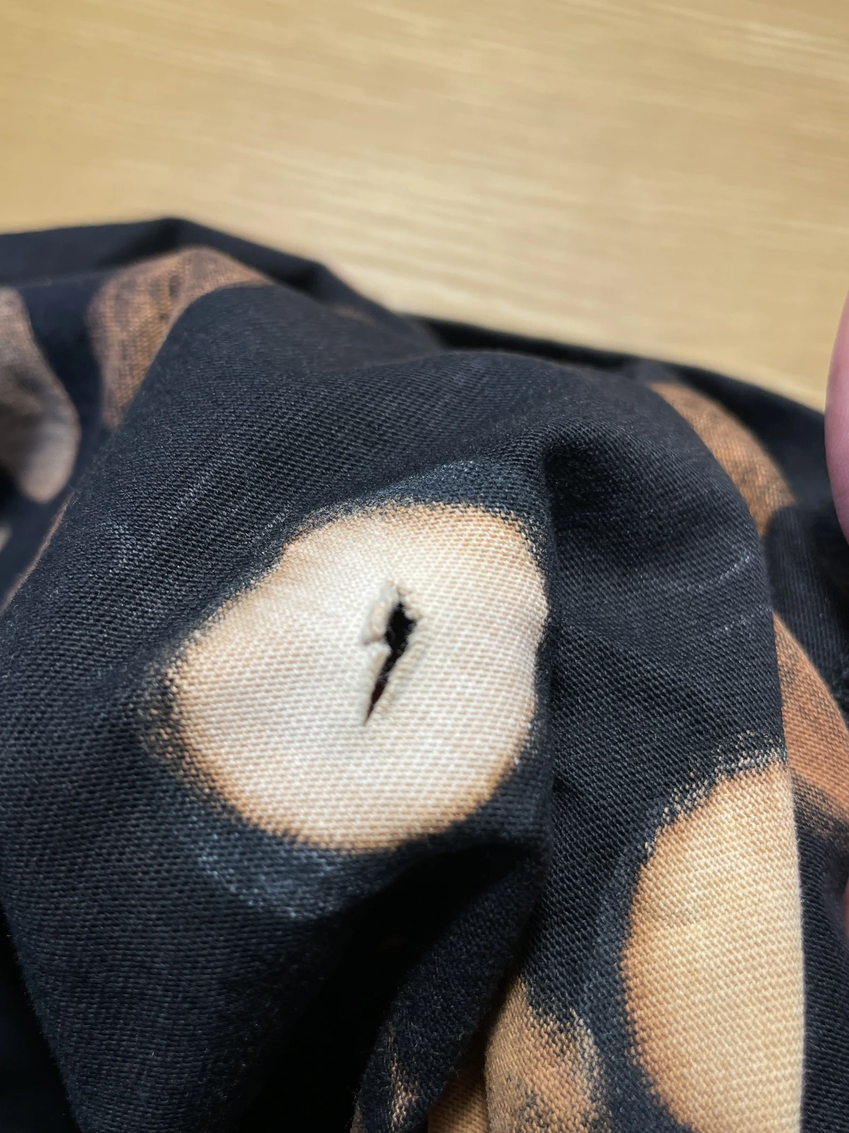Damaged bleach shirt fabric from unneutralized bleach