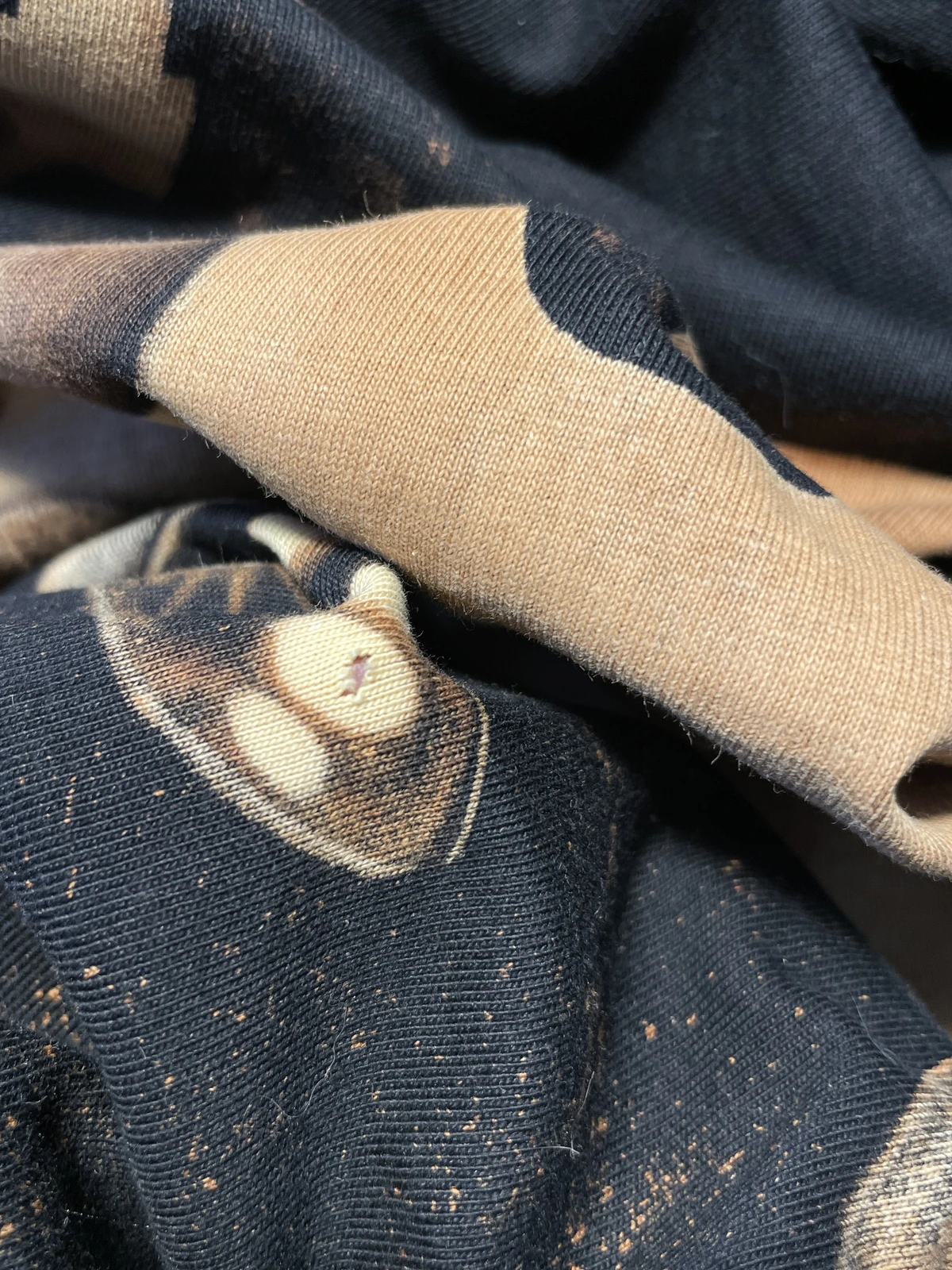Neutralized bleach fabric compared with damaged bleach shirt