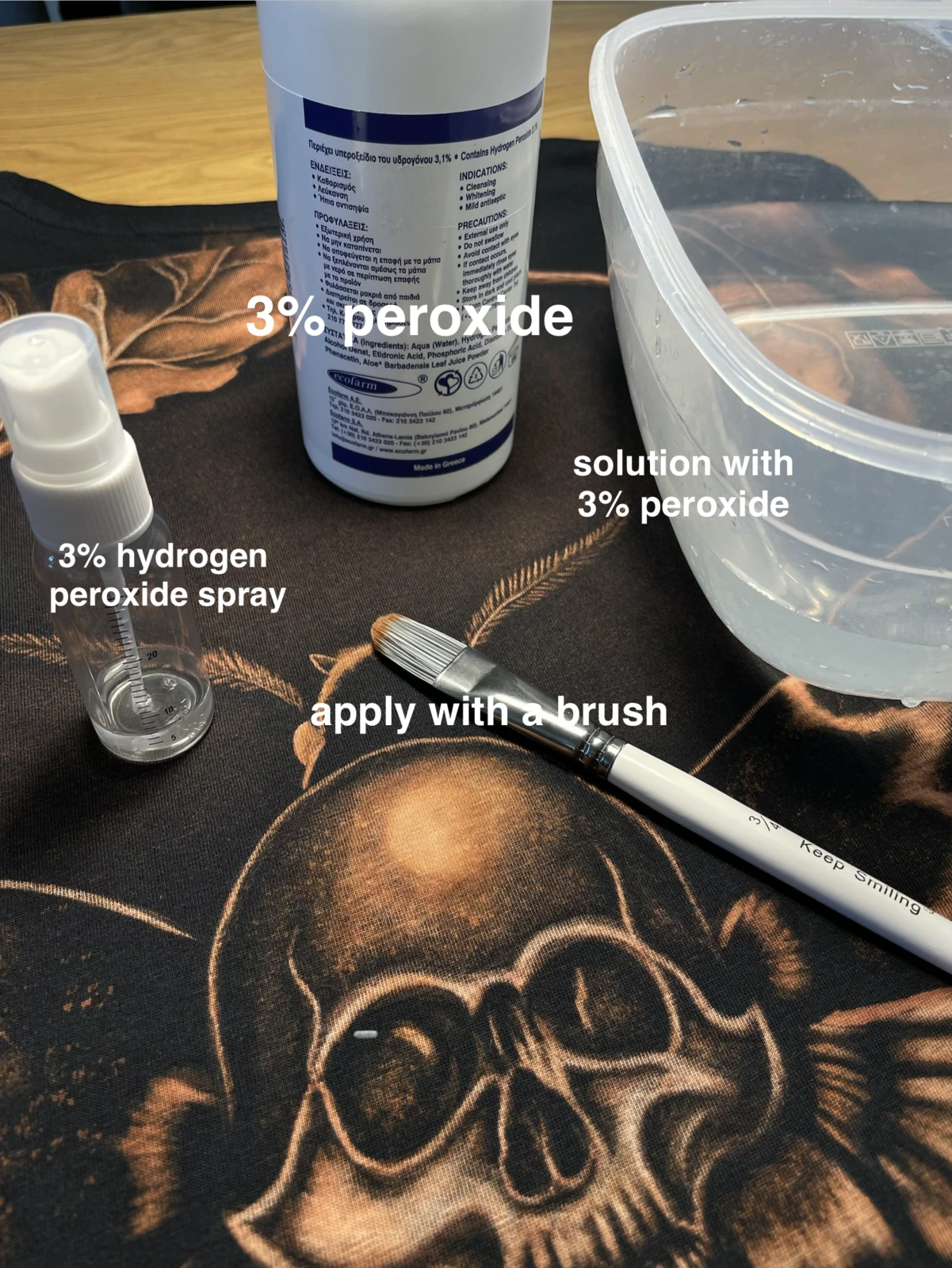 Tools for bleach art aftercare with peroxide and gloves