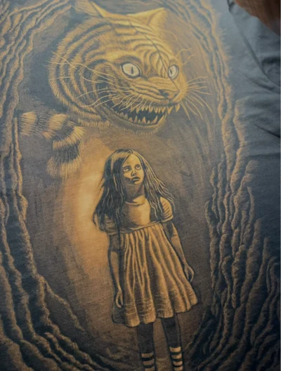 Alice and the Cheshire Cat bleach shirt artwork painted on the back. Inspired by Wonderland, this fantasy design adds detailed bleach shirt artwork and magical bleach art inspiration.