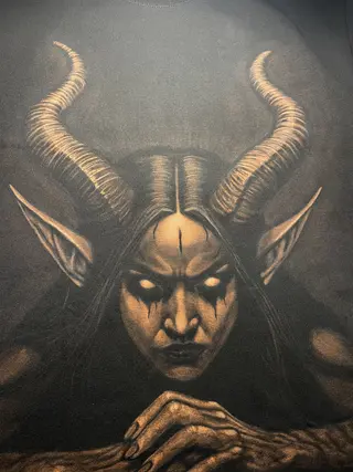 Demon woman bleach art illustration on a black t-shirt