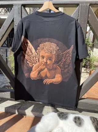 Gothic cherub bleach art illustration on a black t-shirt