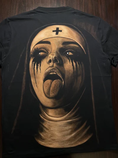 Hand-painted nun bleach art T-shirt with provocative surreal portrait artwork