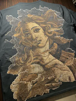 Venus de Milo mosaic-style bleach art illustration on a t-shirt