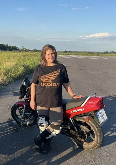 A custom hand-painted bleach art T-shirt featuring the legendary Honda Gold Wing motorcycle on the front. Seeing this unique design worn and enjoyed by its new owner is the best reward for creating wearable art by hand.
