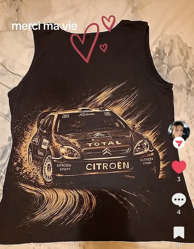 Customer photo wearing a custom Citroën rally tank top created by hand using bleach art techniques. Inspired by classic rally racing and painted on black fabric.