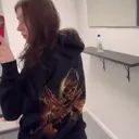 Customer video showing how a hand-painted hoodie with a Tinkerbell-inspired fairy design looks when worn