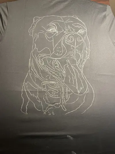 Chalk sketch of American Staffordshire Terrier portrait on the back of T-shirt