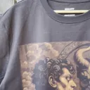 Daylight close-up video showing angel and demon reflection bleach art details