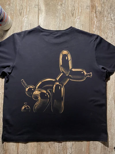 Back view of a Balloon Dog Bleach Art T-Shirt featuring a humorous hand-painted balloon dog design in profile