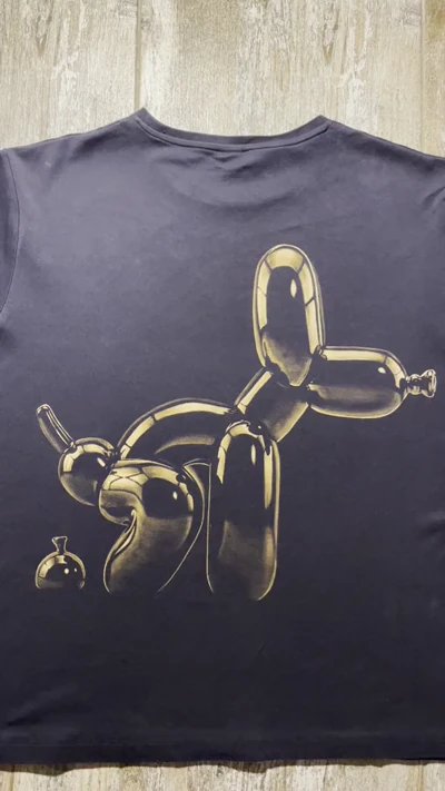 Video showing the back design of the handmade Balloon Dog Bleach Art T-Shirt with a funny balloon dog illustration