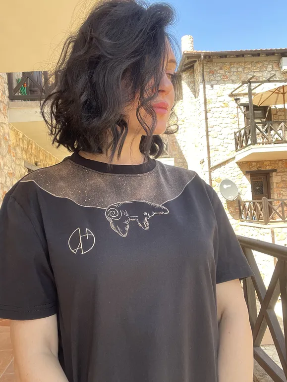 Live view of a celestial moon line art bleach art t-shirt worn by a model