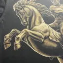 Live photo showing how the David of Sassoun bleach art t-shirt looks when worn