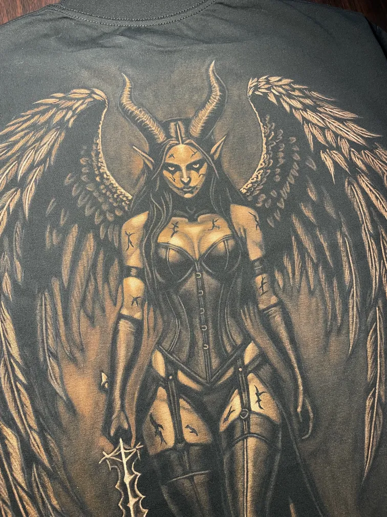 Close-up of a dark fantasy demon warrior illustration with horns and wings