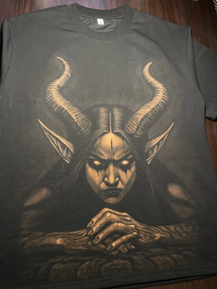 Demon woman bleach art illustration displayed on the front of a black t-shirt