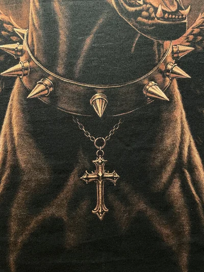 Close-up of the painted cross and spiked collar in the Doberman bleach art design