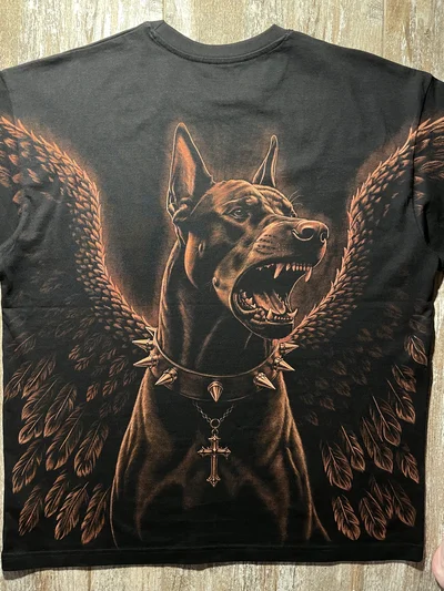 Closer back view of the hand-painted Doberman T-shirt with angel wings extending onto the sleeves