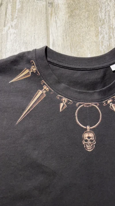 Front view of the Doberman T-shirt with bleach-painted spikes around the neckline