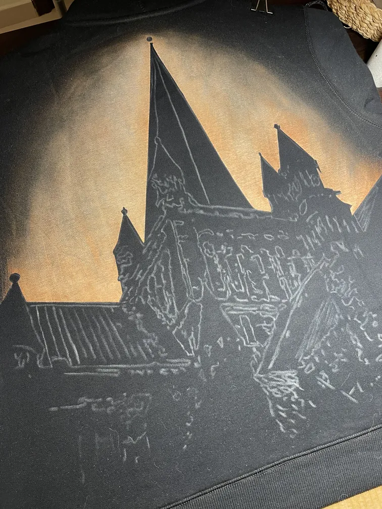 Early stage of a gothic architecture illustration sketched on a hoodie