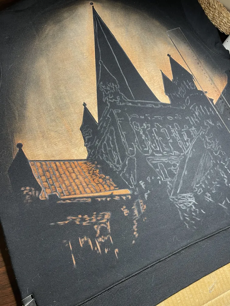 Work in progress of a gothic cathedral illustration painted with bleach on a hoodie