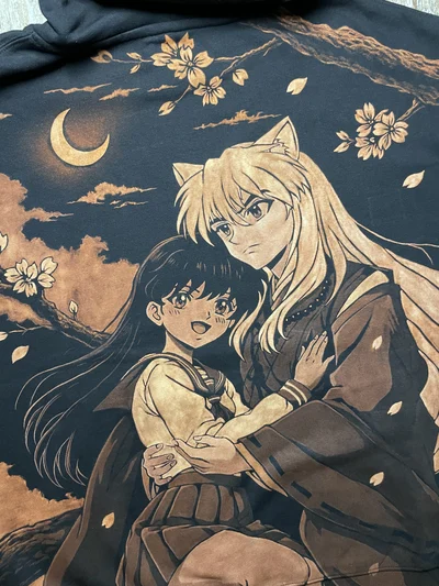 Close up of Inuyasha holding Kagome in the detailed hand painted bleach art scene on the back of a black hoodie