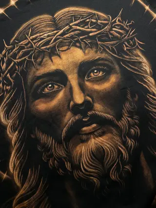 Close-up of hand painted bleach art portrait of Jesus Christ with crown of thorns