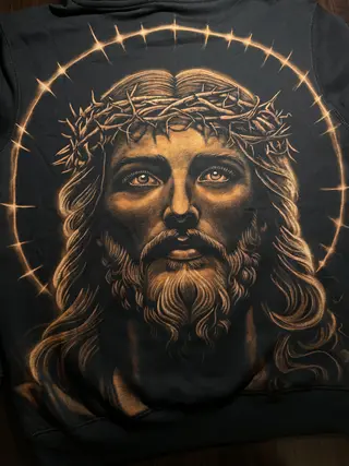 Hand painted bleach art hoodie with Jesus Christ portrait on the back, full view