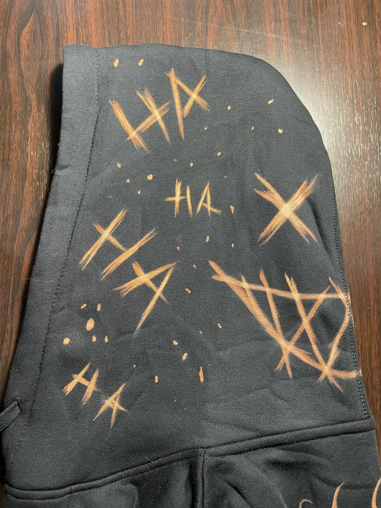 Left side of the hood featuring a dark comic-style bleach art detail