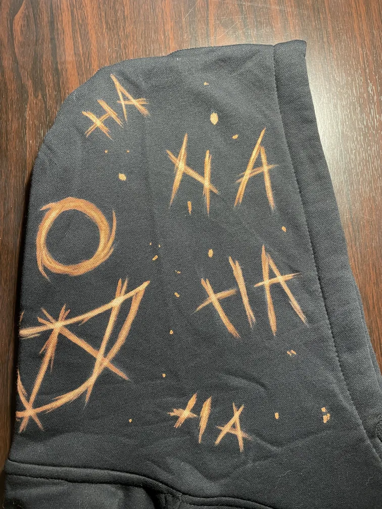 Right side of the hood with joker-inspired bleach art elements