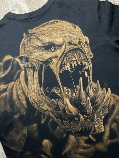 Close-up of the handmade bleach art Lifestealer from Dota 2 on the back of a black T-shirt