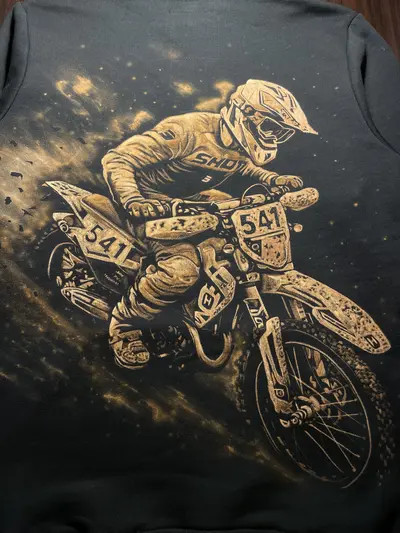 Close-up of motorcycle racer bleach art on the back of hand painted hoodie
