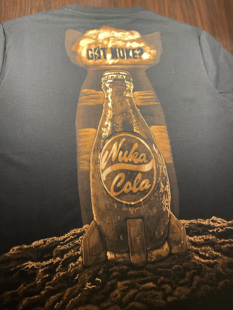 Nuka-Cola–inspired bleach art illustration covering the back of a black t-shirt