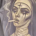 Daylight video showing a nun with cigarette bleach art design on a fleece hoodie