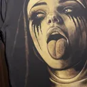 Video showing the full back view of a hand painted T-shirt with a bleach art nun illustration sticking out her tongue